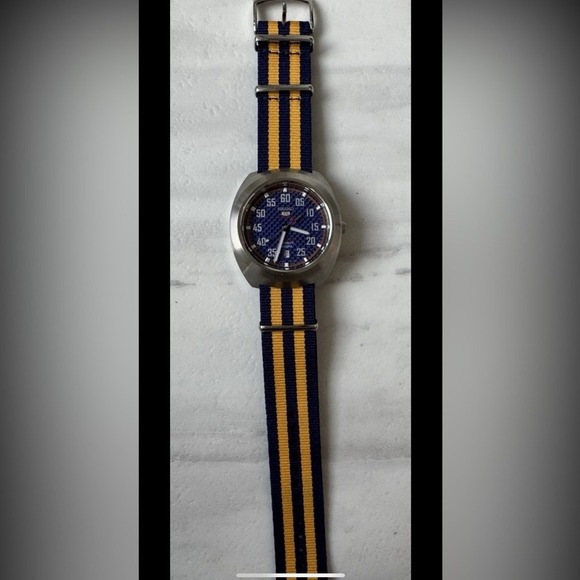 Seiko Silver Watch with Blue and Yellow Striped Band